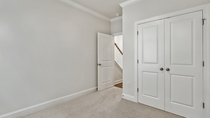 Bedroom with carpet flooring