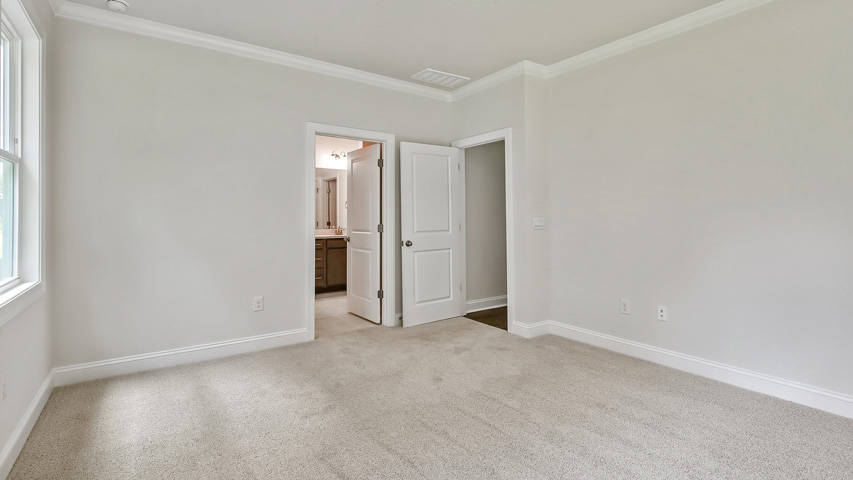 Bedroom with carpet flooring
