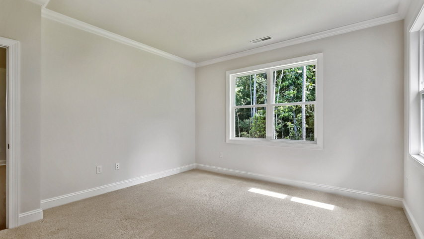 Bedroom with carpet flooring