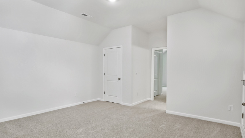 Bedroom with carpet flooring