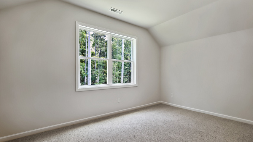 Bedroom with carpet flooring