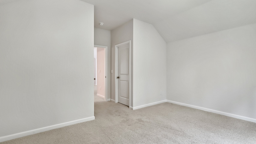 Bedroom with carpet flooring