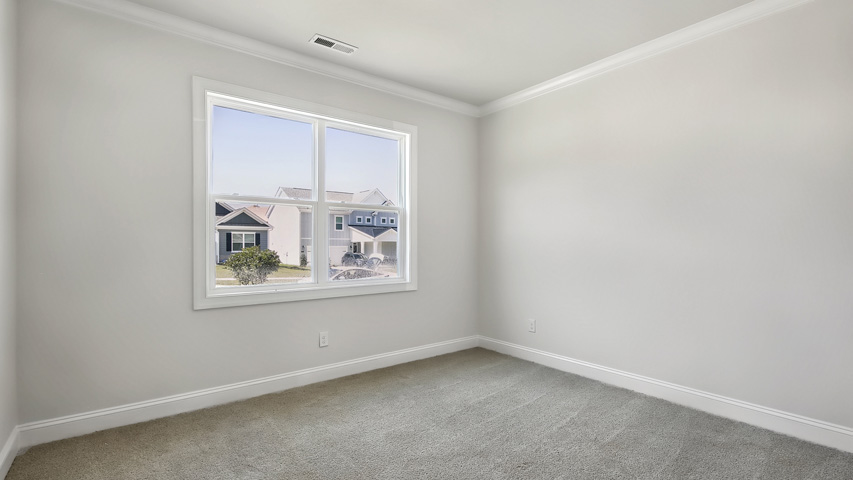 Bedroom with carpet flooring