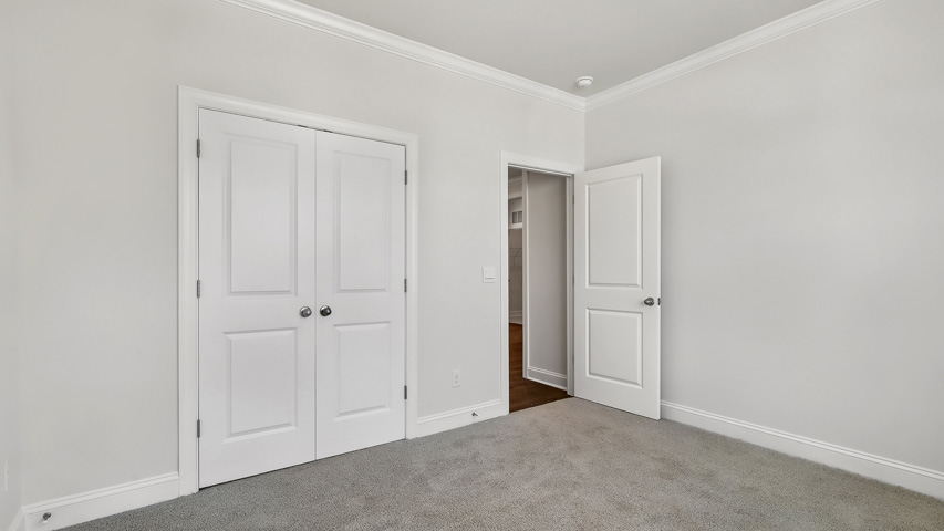 Bedroom with carpet flooring