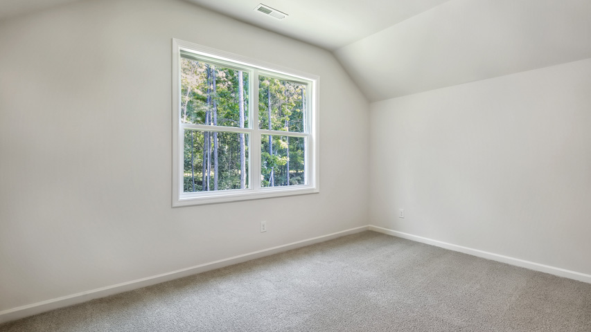 Bedroom with carpet flooring