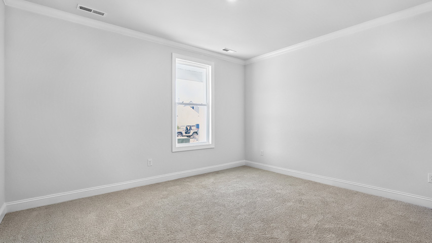Bedroom with carpet flooring