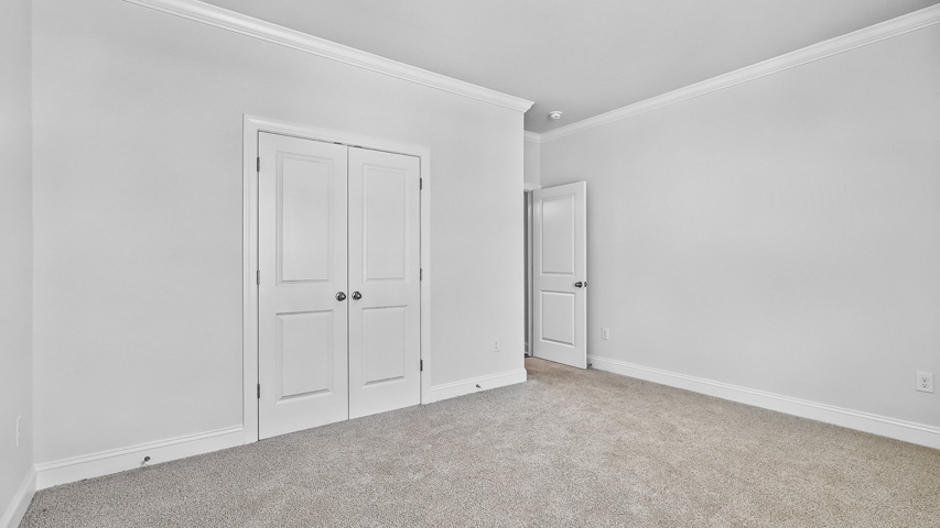 Bedroom with carpet flooring