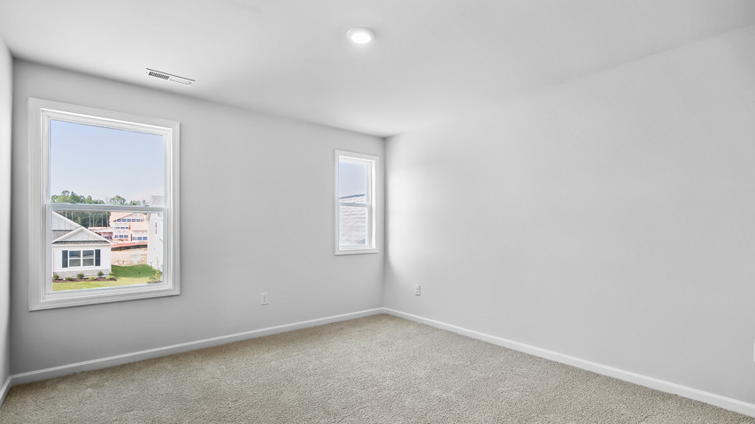 Bedroom with carpet flooring