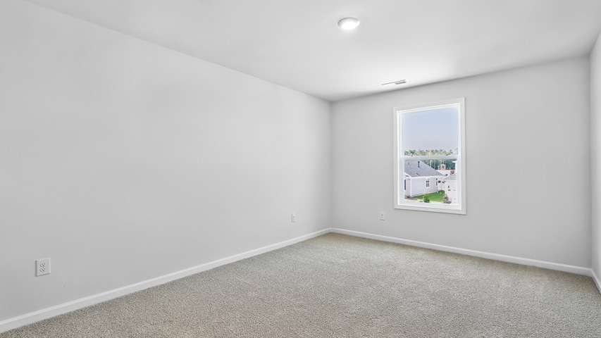 Bedroom with carpet flooring