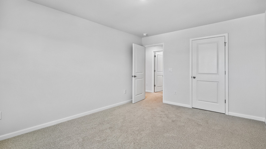 Bedroom with carpet flooring