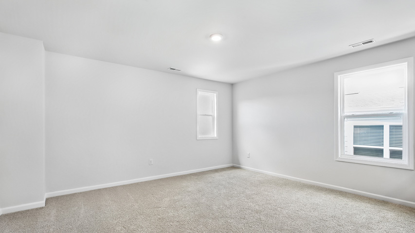 Bedroom with carpet flooring