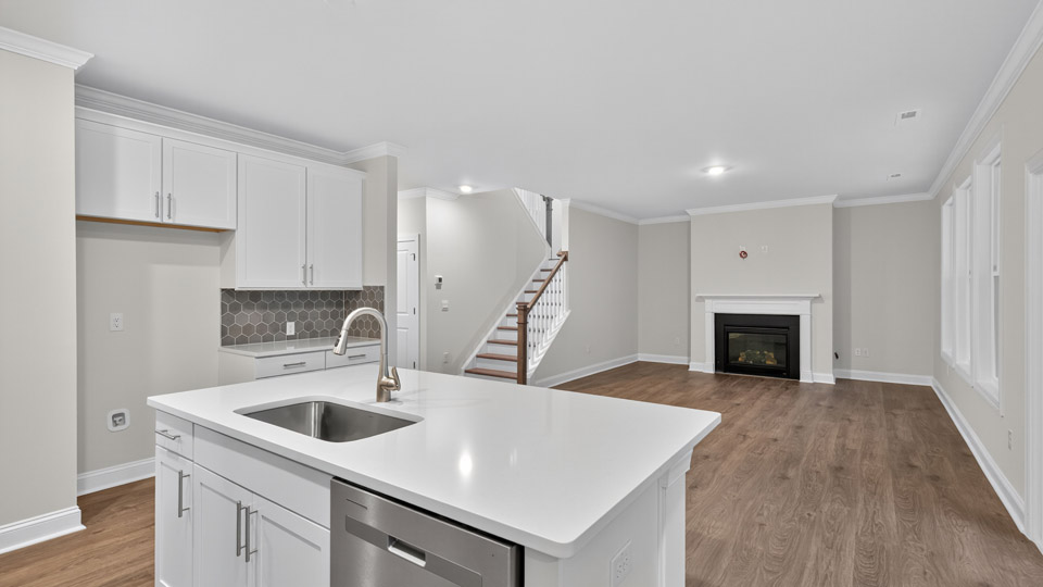kitchen overlooking living room with revwood flooring