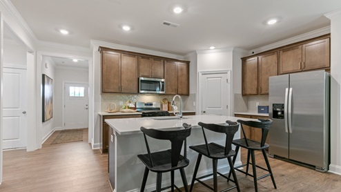 kitchen with quartz countertops and stainless steel appliances