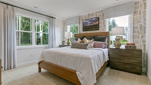 bedroom with lots of natural lighting