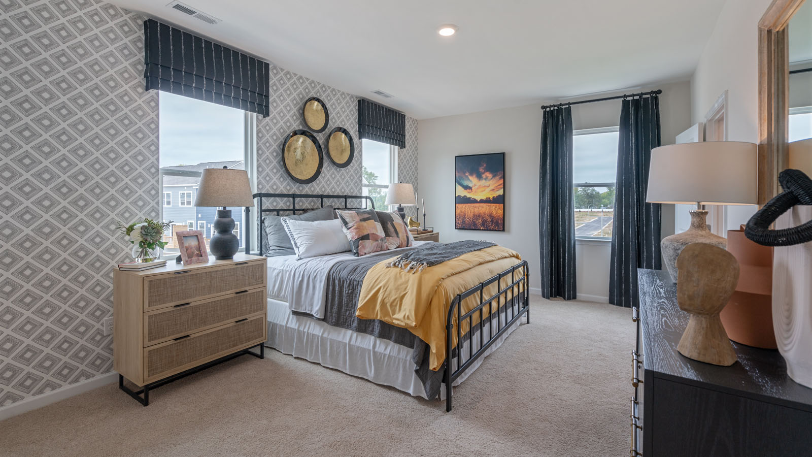 Bedroom with natural lighting and carpet flooring