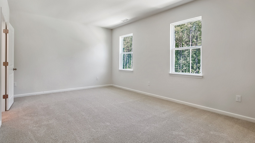 Bedroom with carpet flooring