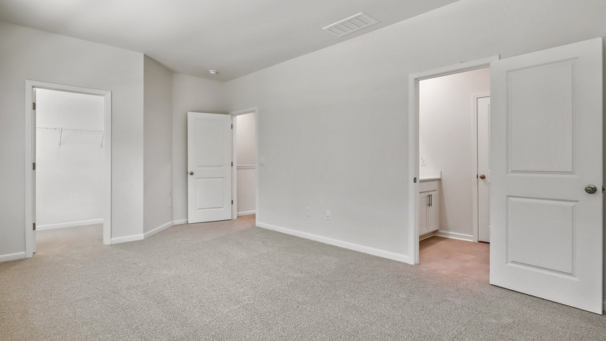 Bedroom with carpet flooring