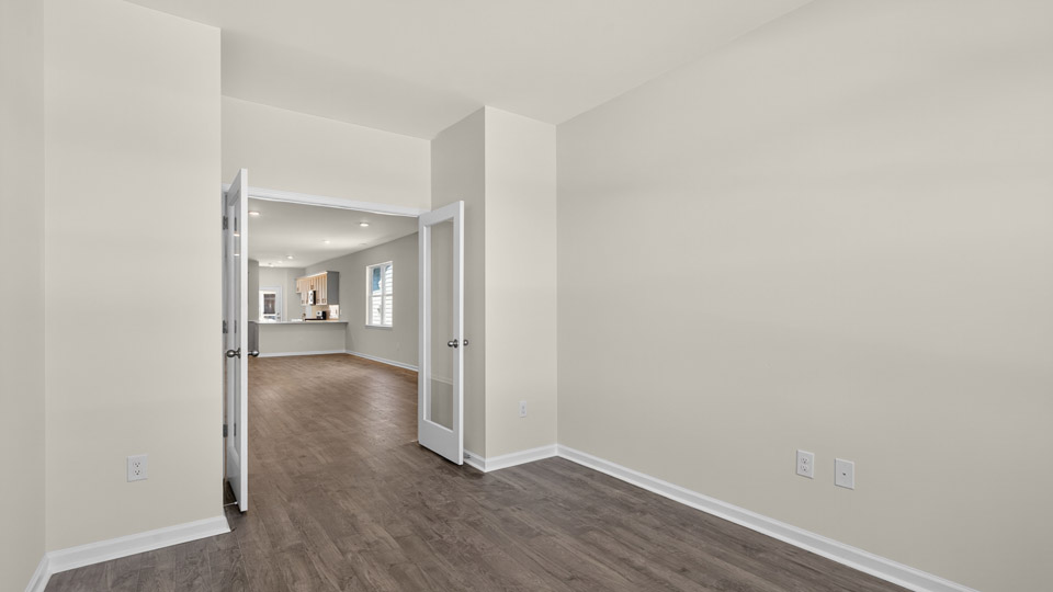 study with revwood flooring and french doors