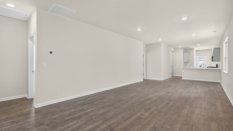 living room with revwood flooring