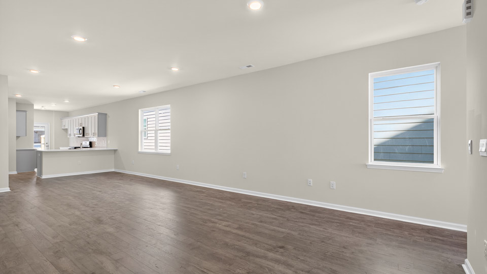 living room with revwood flooring
