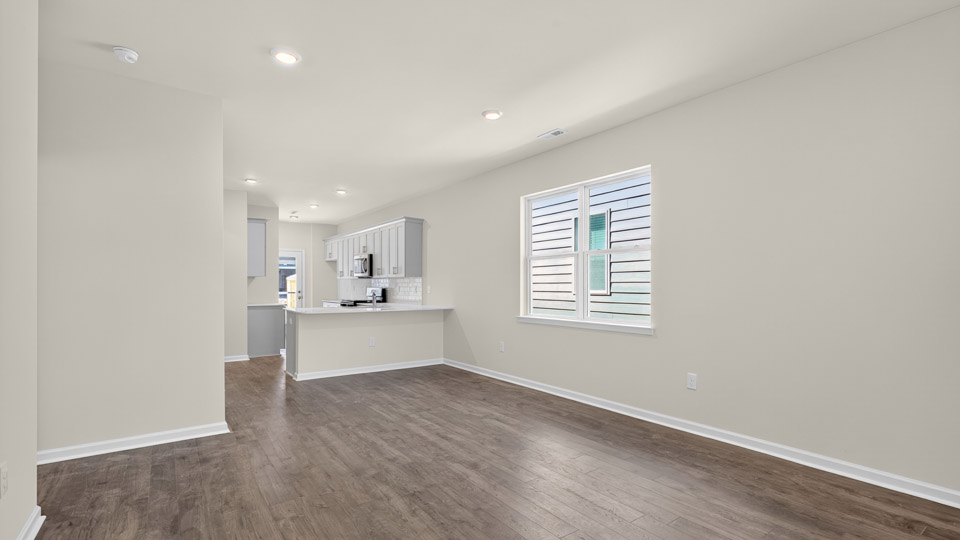 living room with revwood flooring