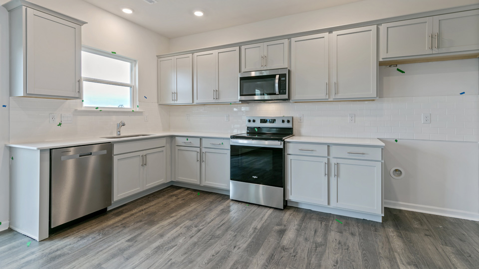 Kitchen with grey cabinets