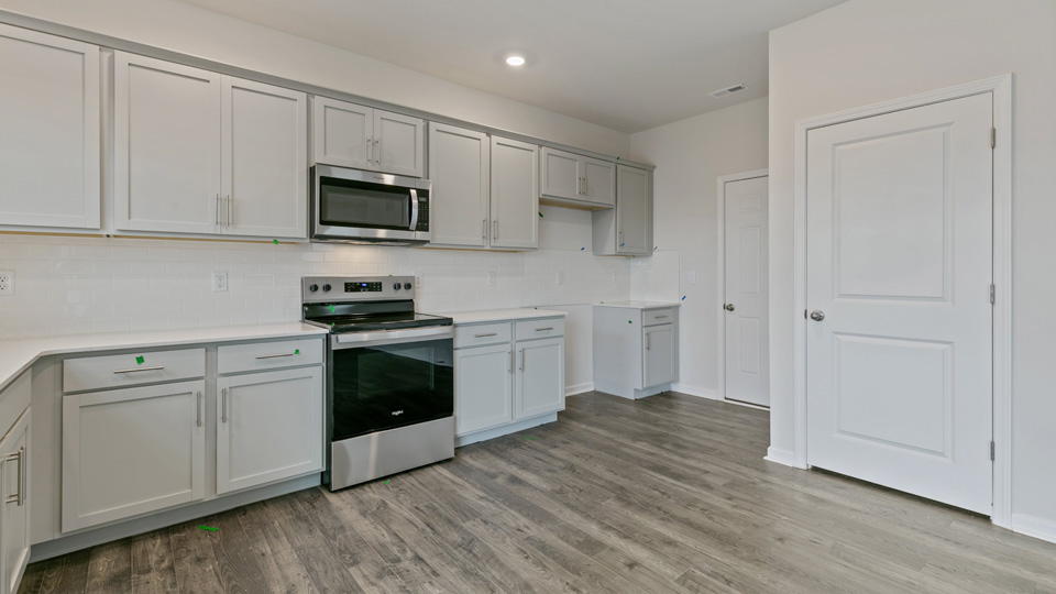 Kitchen with grey cabinets