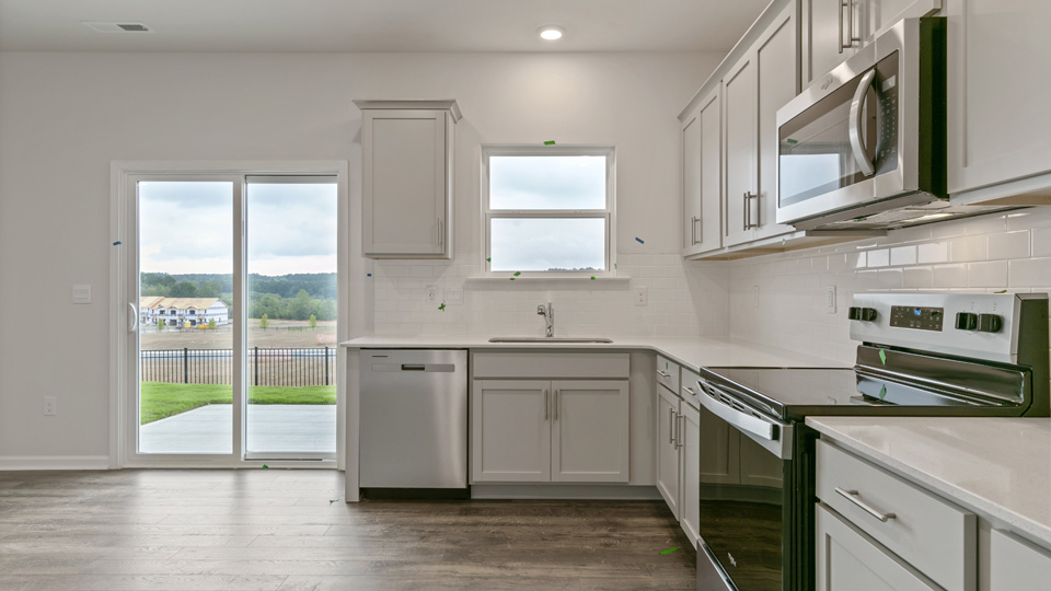 Kitchen with grey cabinets