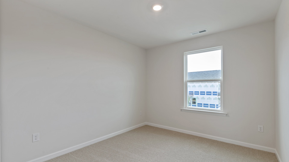 Bedroom with carpet