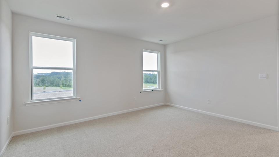 Bedroom with carpet