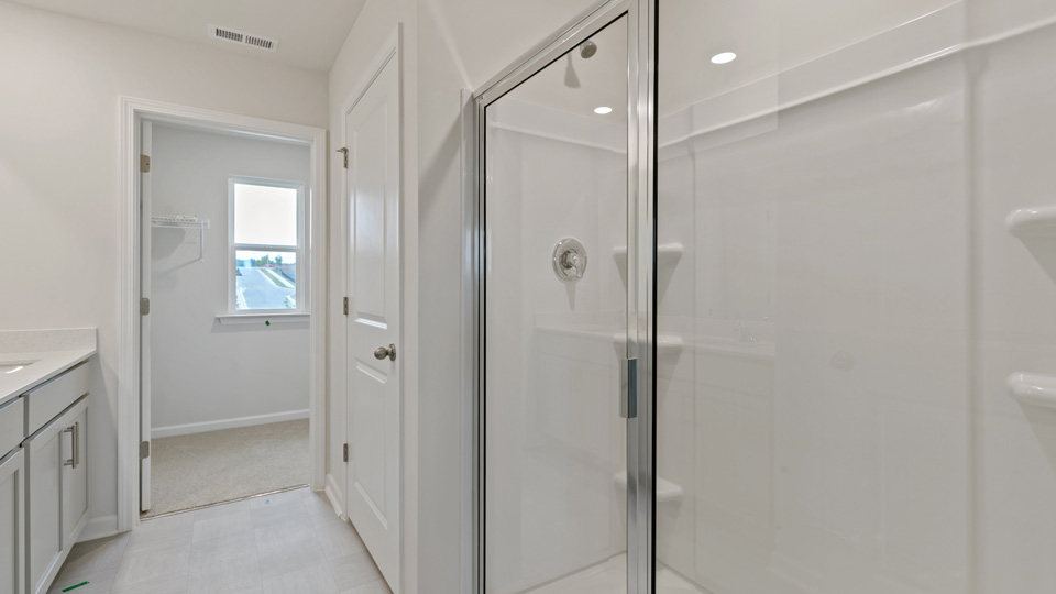 Bathroom with grey cabinets