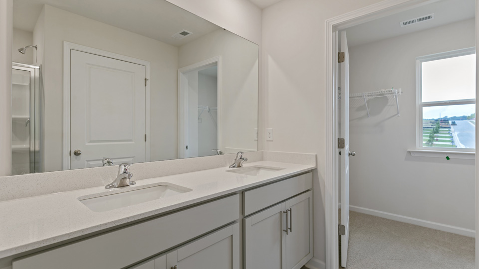 Bathroom with grey cabinets