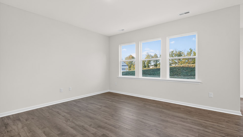 living room with revwood flooring