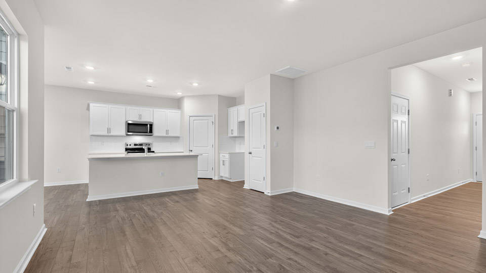 living room with revwood flooring