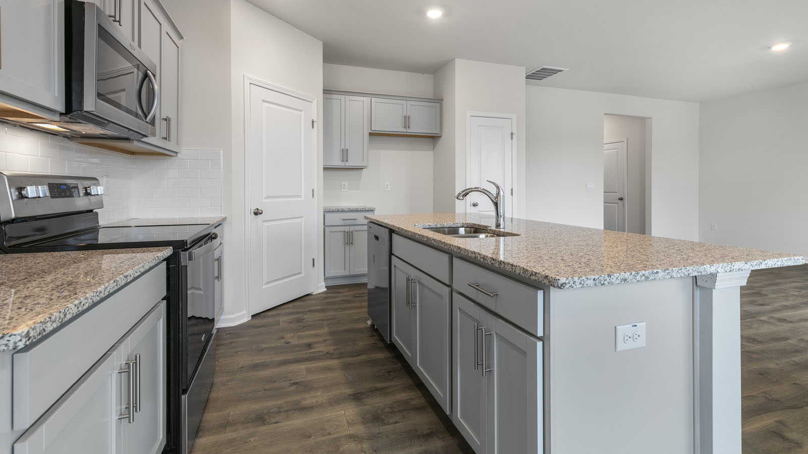 Kitchen with grey cabinets