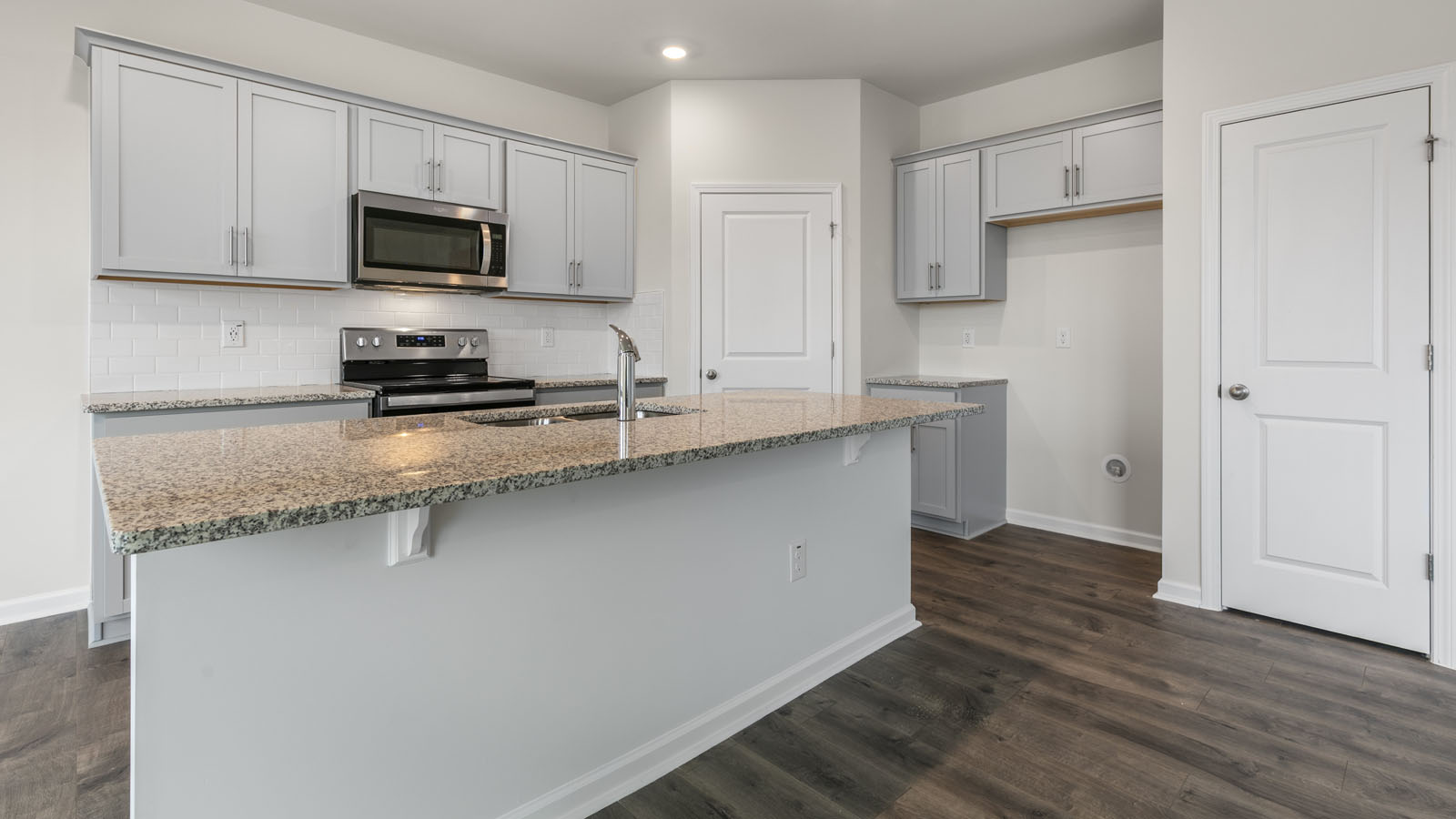 Kitchen with grey cabinets