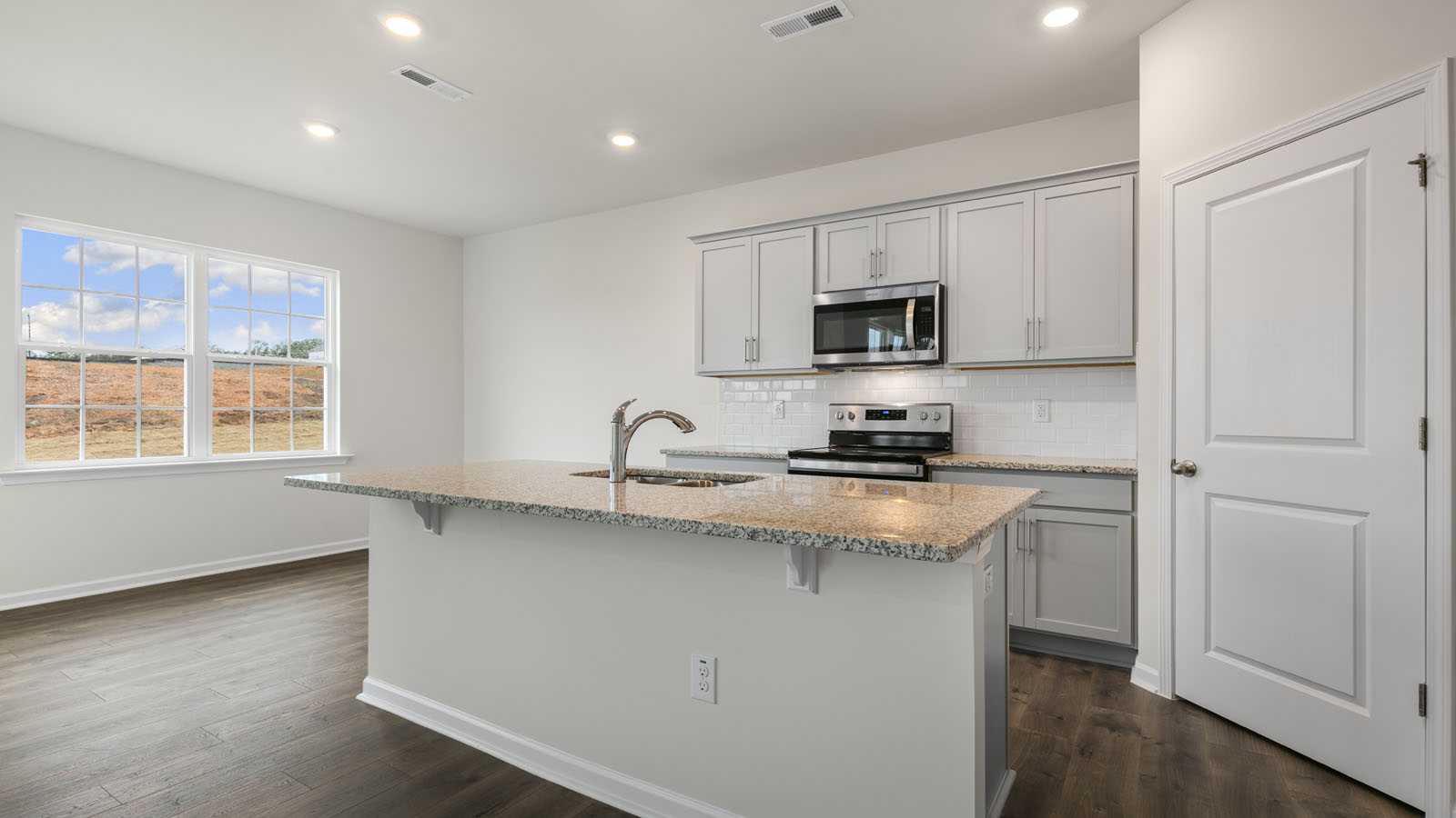 Kitchen with grey cabinets