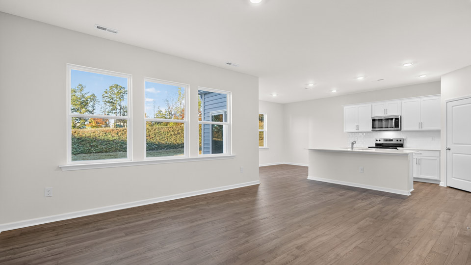 living room with revwood flooring