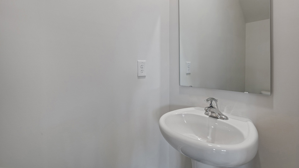 Bathroom with white cabinets
