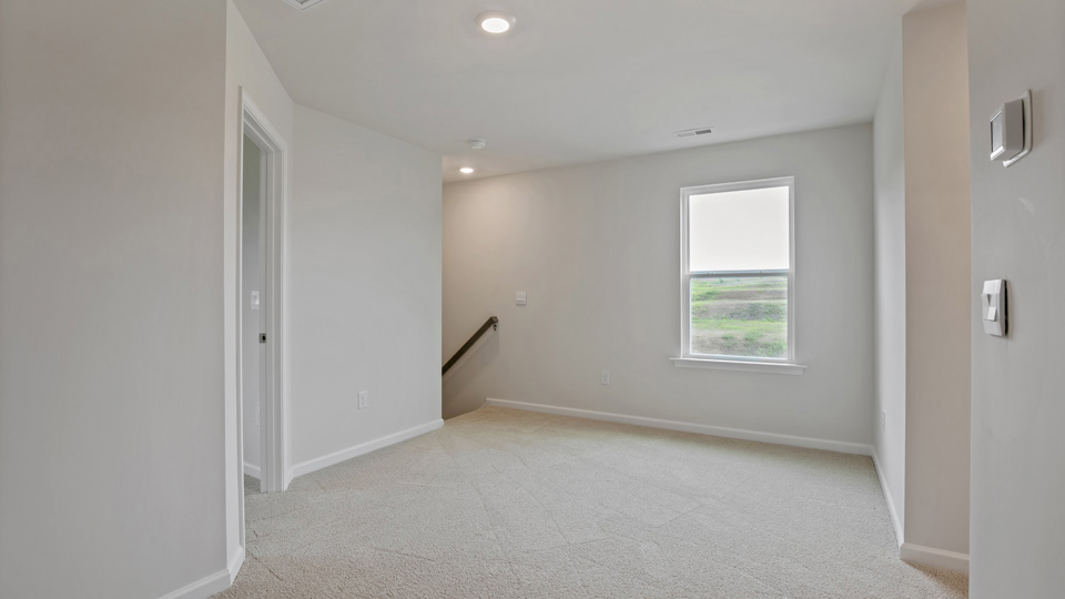 Bedroom with carpet flooring