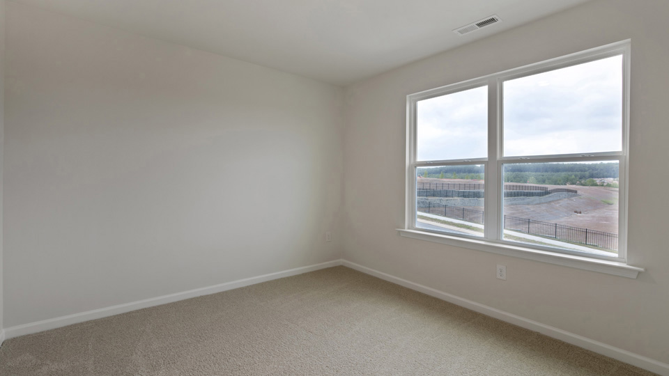Bedroom with carpet flooring
