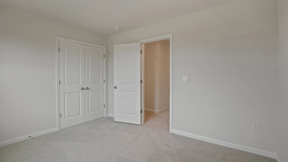 Bedroom with carpet flooring