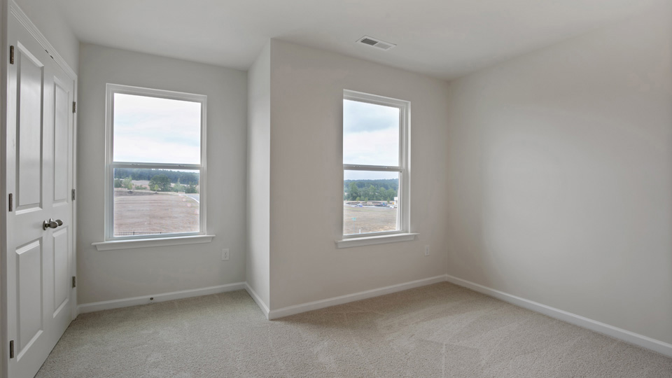 Bedroom with carpet flooring