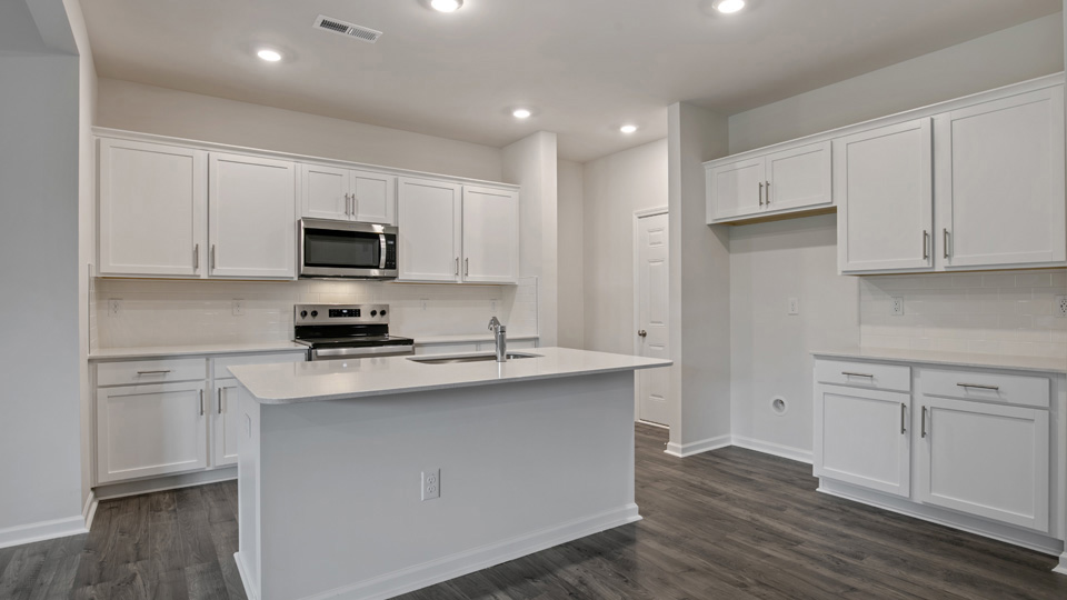Kitchen with white cabinets