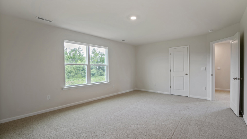 Bedroom with carpet