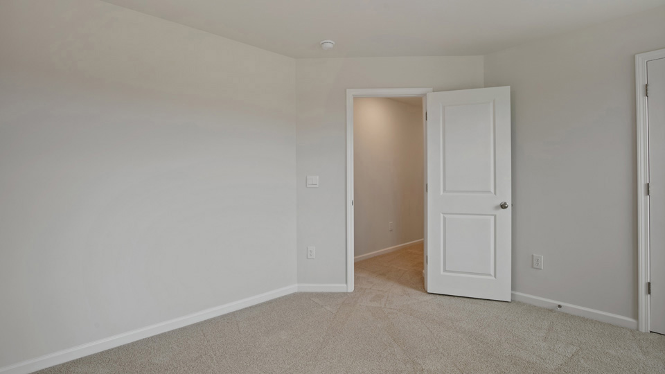 Bedroom with carpet