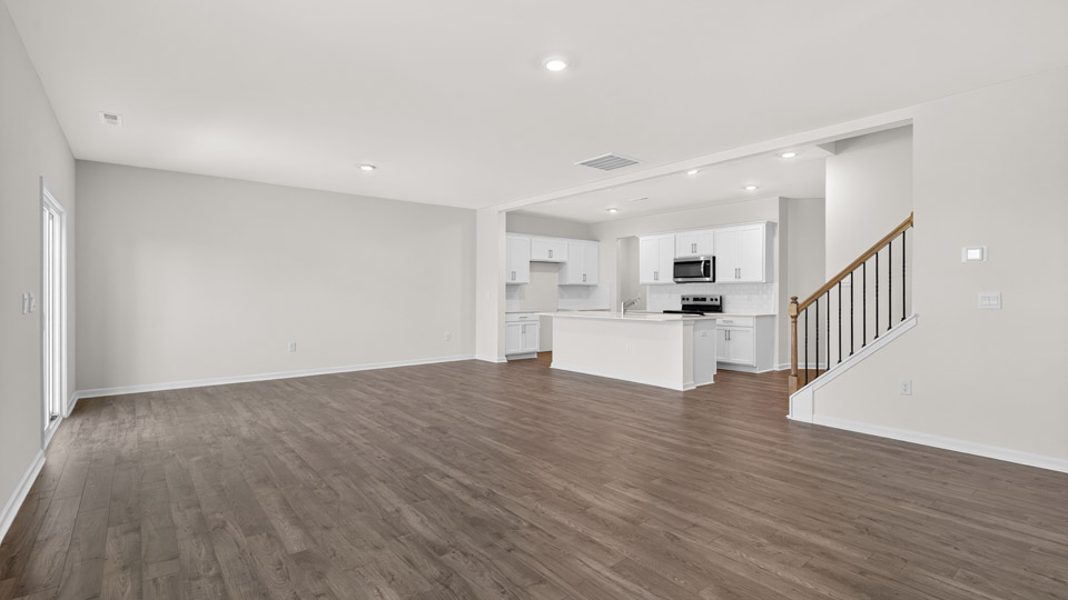 living room with revwood flooring