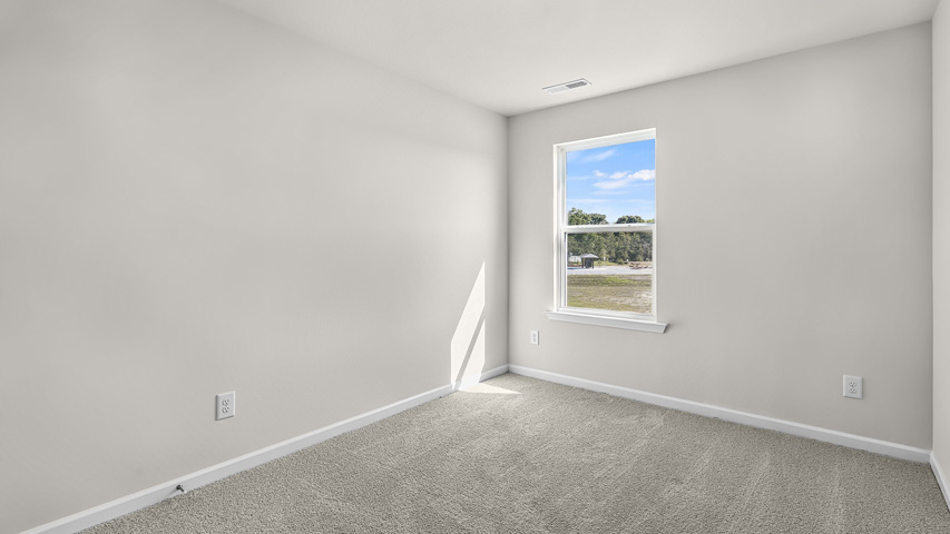 Bedroom with carpet flooring
