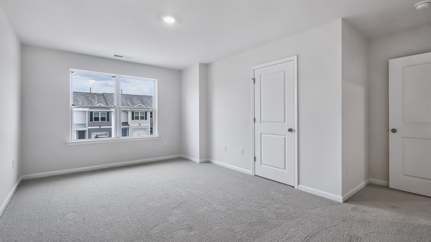 Bedroom with carpet flooring