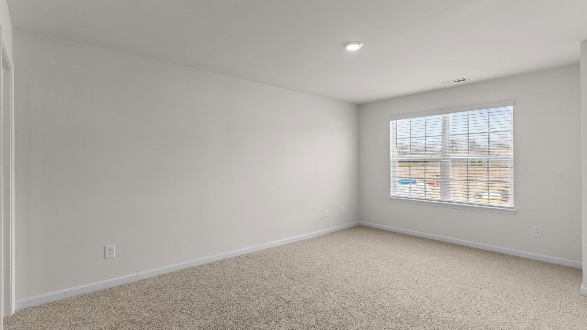 Bedroom with carpet flooring
